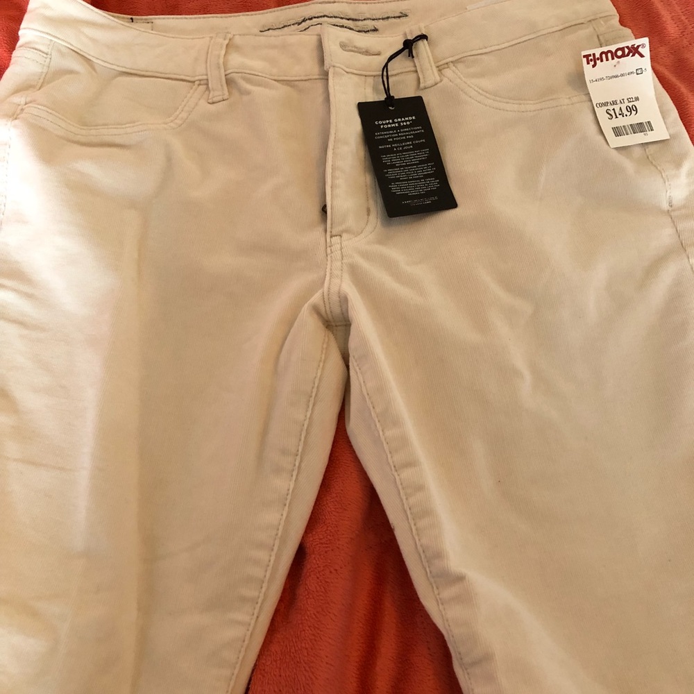 Cream cord pants.